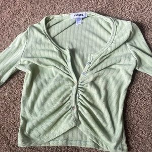 Light green long sleeve button up size small with  stretchy fabric and lace